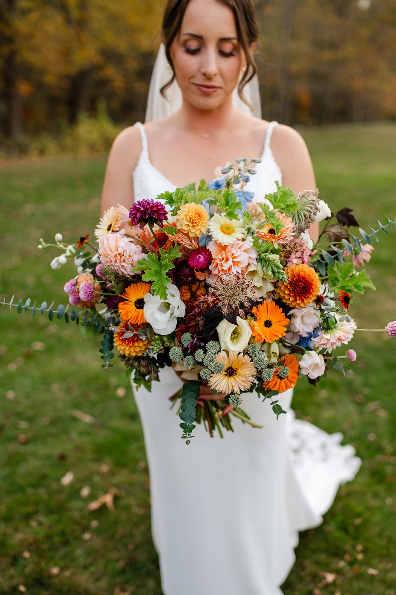 Fall bridal bouquet of dahlias, calendula and eucalyptus